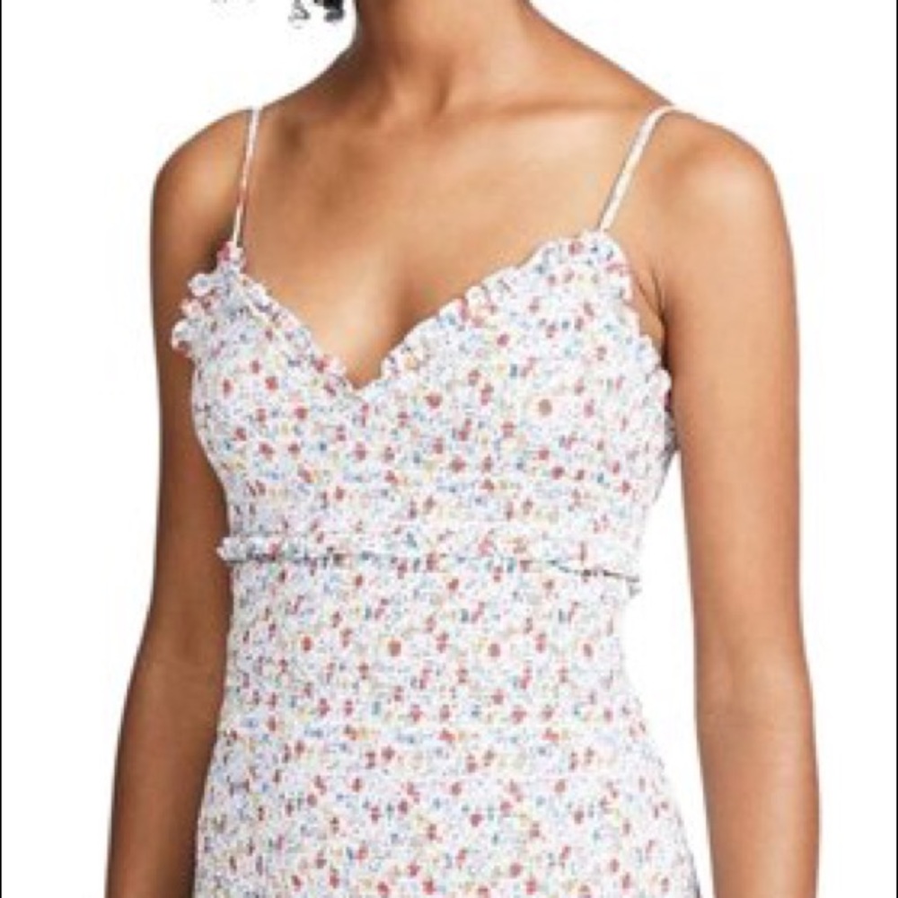 Likely floral smocked mini dress size 6 (fits like a small/4) perfect condition!